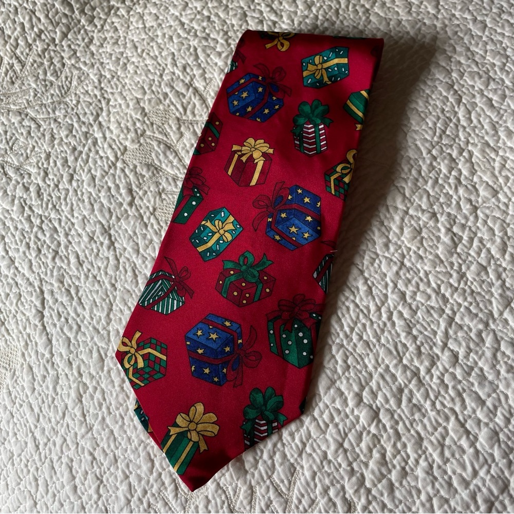 Christmas Necktie by John Henry has Multicolored Presents on a Red Background